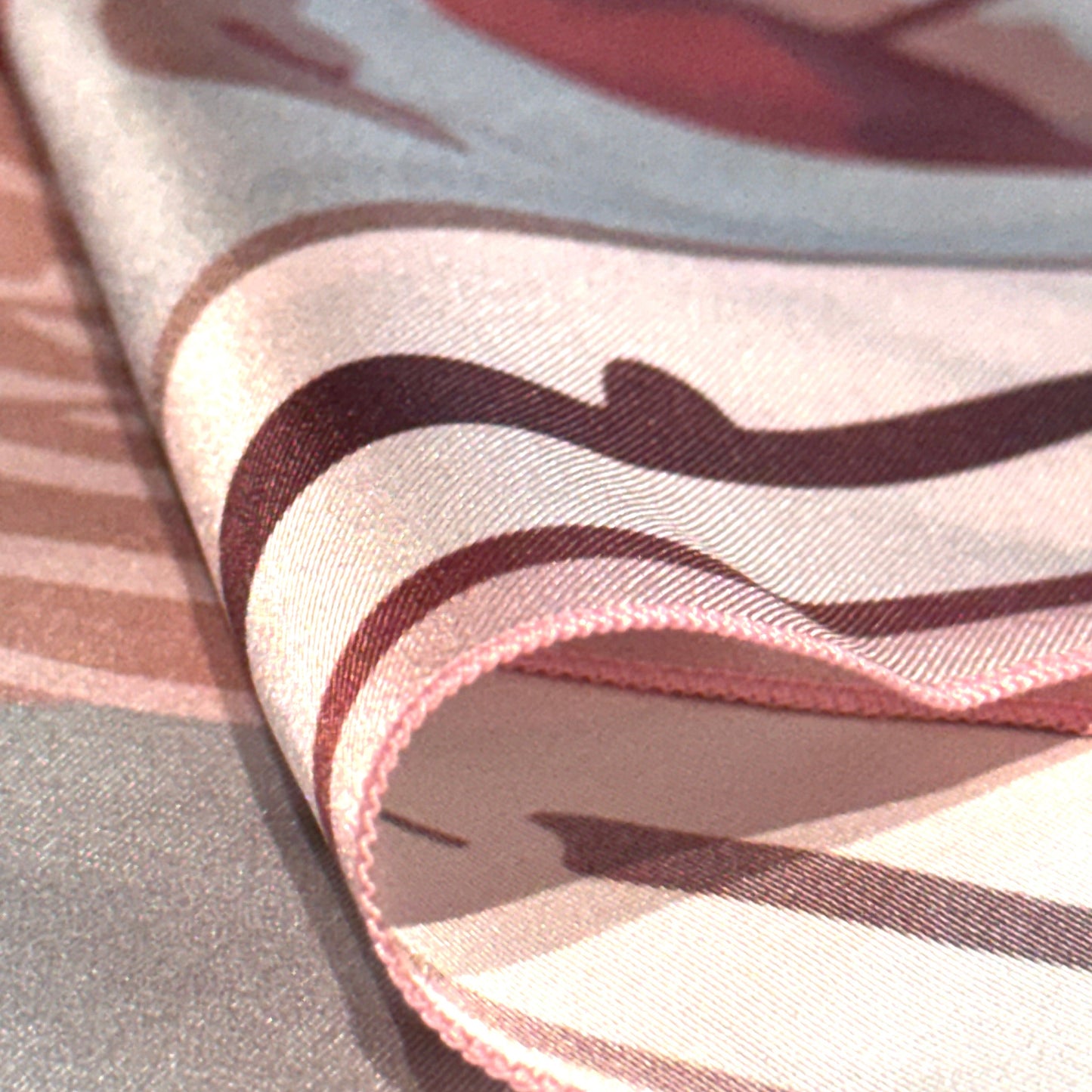 Luxury silk scarf Ginger Lace by NOE MI, wearable art design with surreal feminine figure, candles, chalices, and dragonflies, in pink and ivory palette.