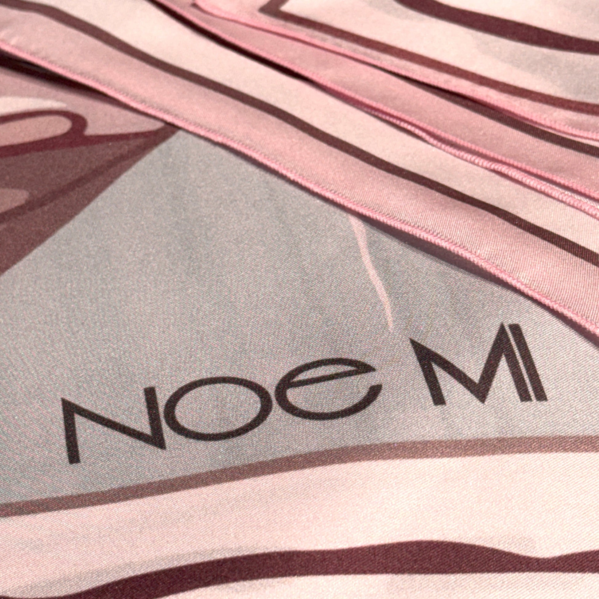 NOE MI Ginger Lace silk scarf, square accessory featuring surreal feminine design with dragonflies, flowers, and symbolic details in pink and ivory palette.