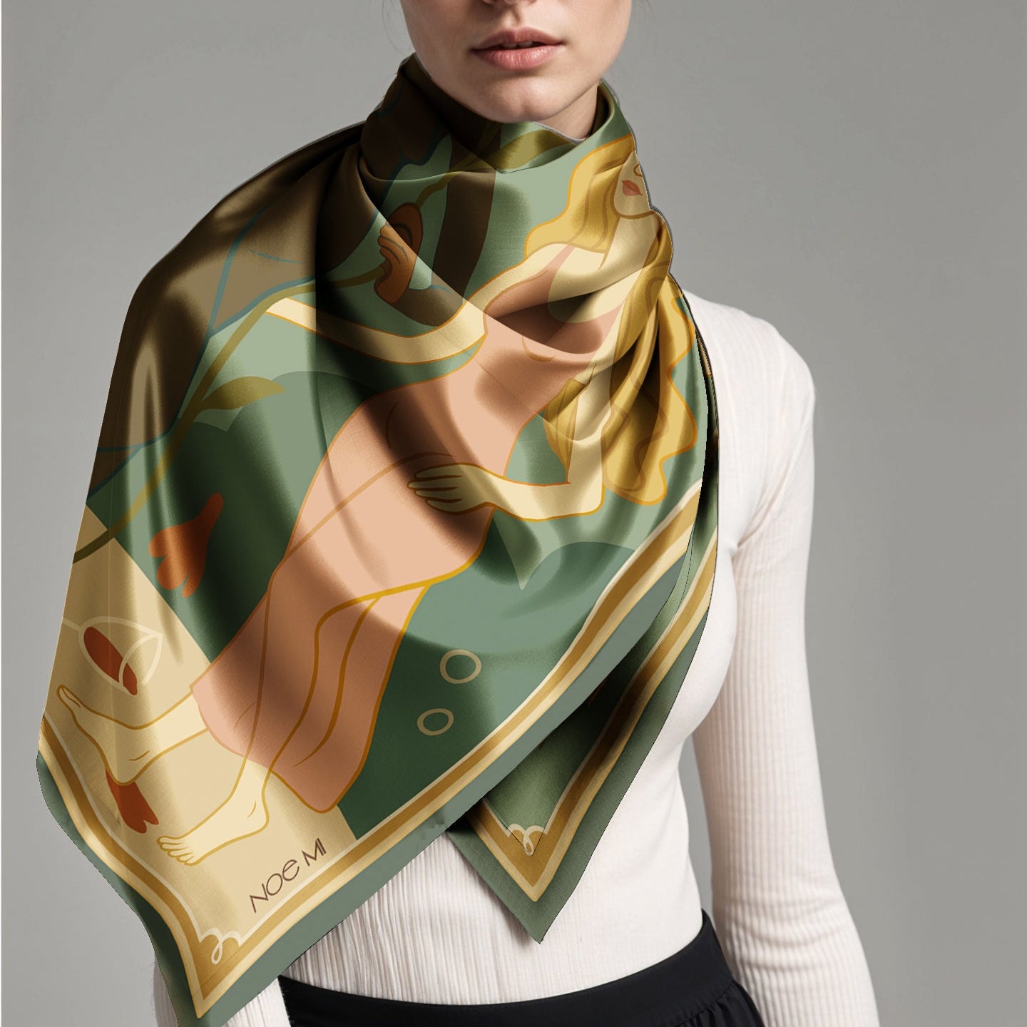 Woman wearing a patterned luxury art silk twill scarf against a gray background