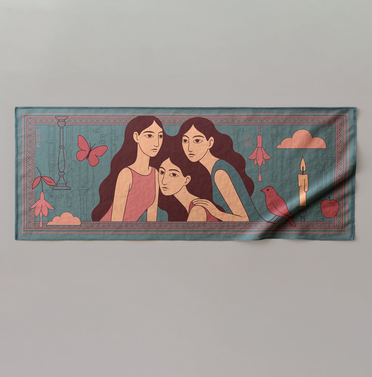Decorative colorful silk or chiffon pareo/sarong with illustrations of three women and various symbols on a gray background