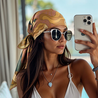 Woman in a white bikini taking a selfie by a pool wearing a luxury art silk twill scarf as a bandana
like hermes and dior