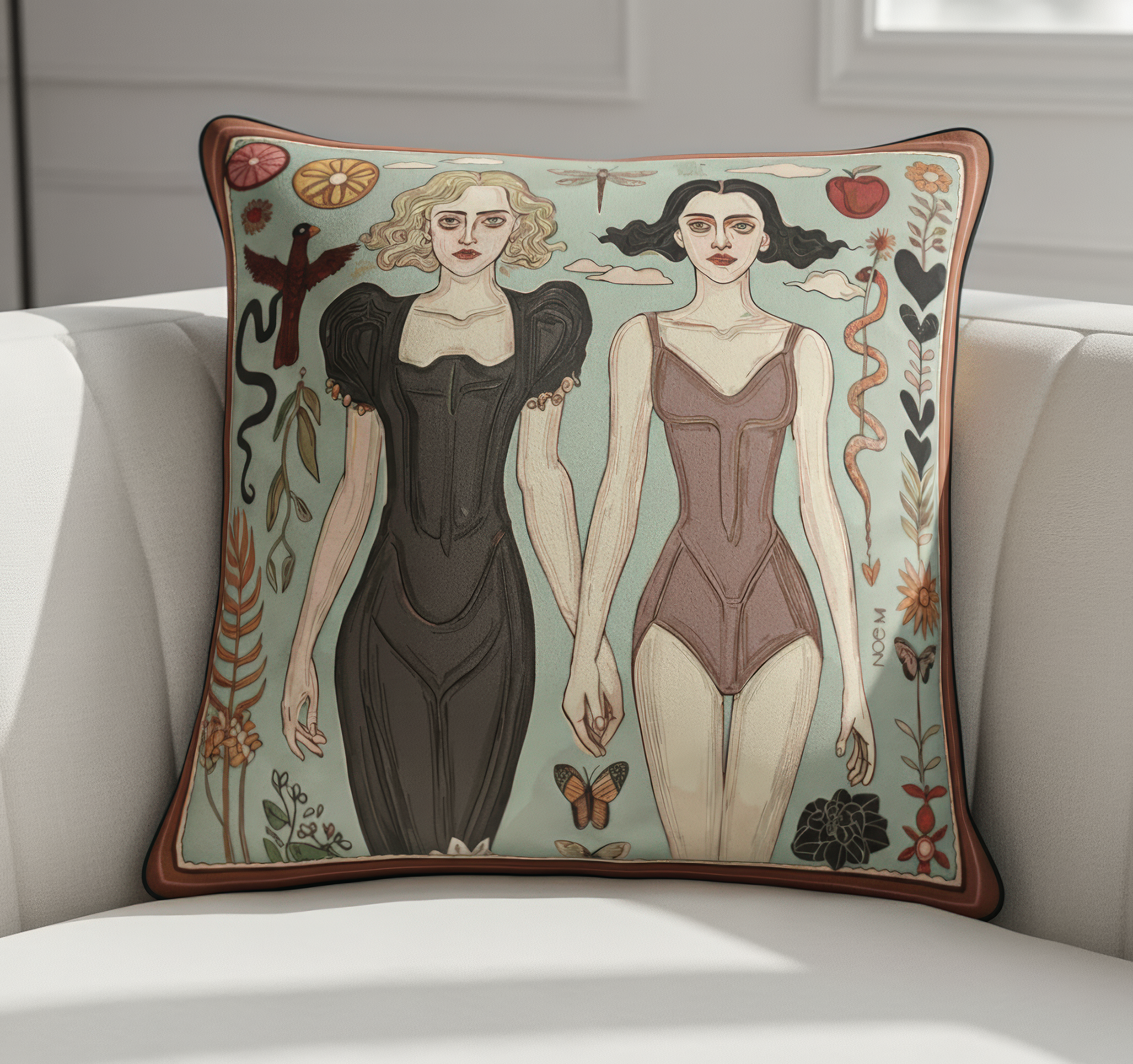 Contemporary statement cushion in earthy tones with poetic dual female figures , perfect for art lovers and collectors. Design by NOE MI 