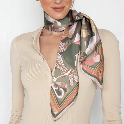 Woman wearing a patterned Luxury art silk twill scarf by NOE MI  