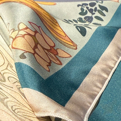 Designer silk scarf by NOE MI, luxury square scarf with surreal storytelling, feminine artwork in green, red, and cream tones.