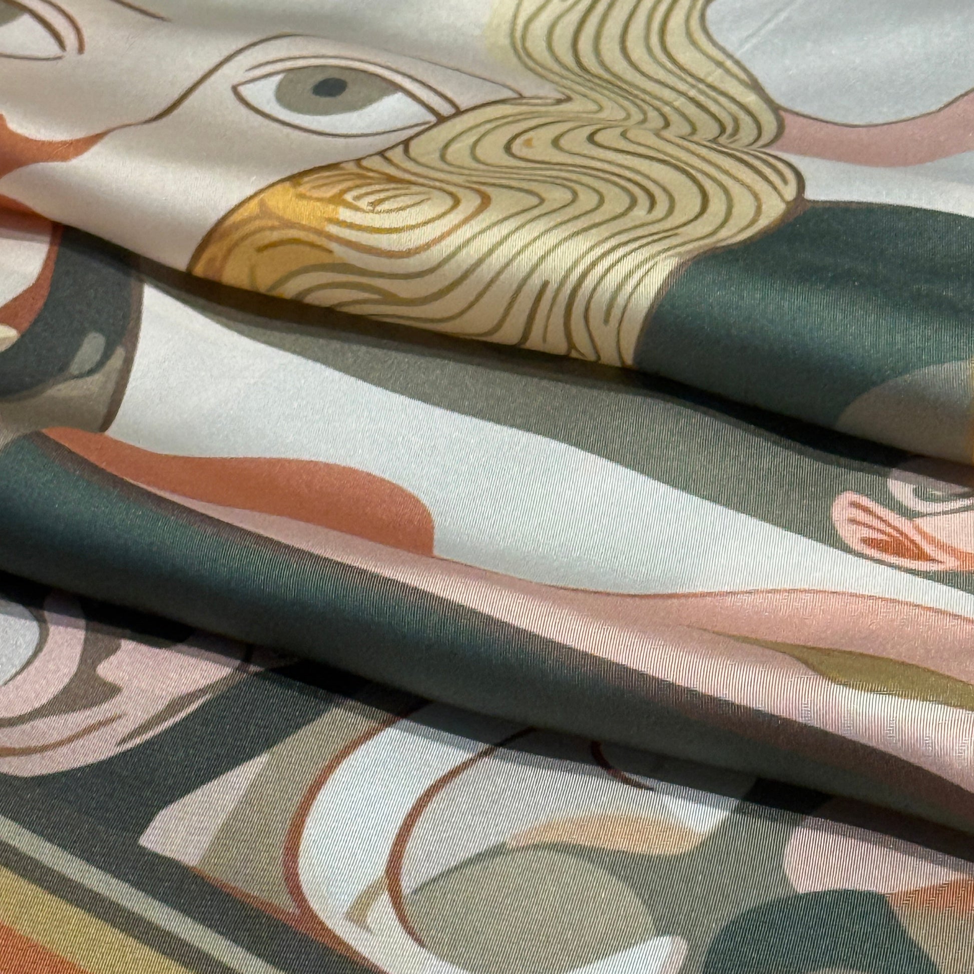 NOE MI Golden Threads silk scarf, luxury square scarf in blush pink, olive green, and golden tones, featuring feminine surreal artwork with dragonflies, bird, and symbolic motifs.