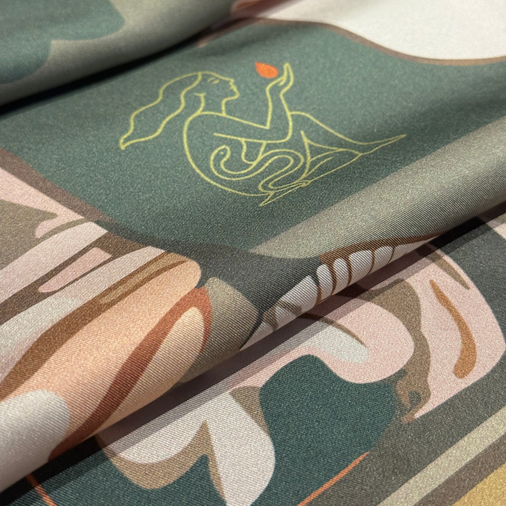 NOE MI designer scarf, Golden Threads artwork in pink, gold, and olive green, feminine surrealist design with symbolic bird and dragonflies.