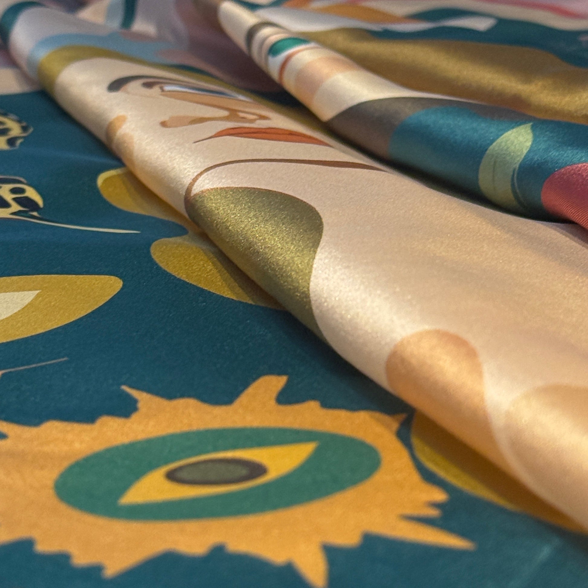 Luxury silk scarf Two of a Kind by NOE MI, wearable art design in pink and green palette with feminine surrealist figures and symbolic motifs.