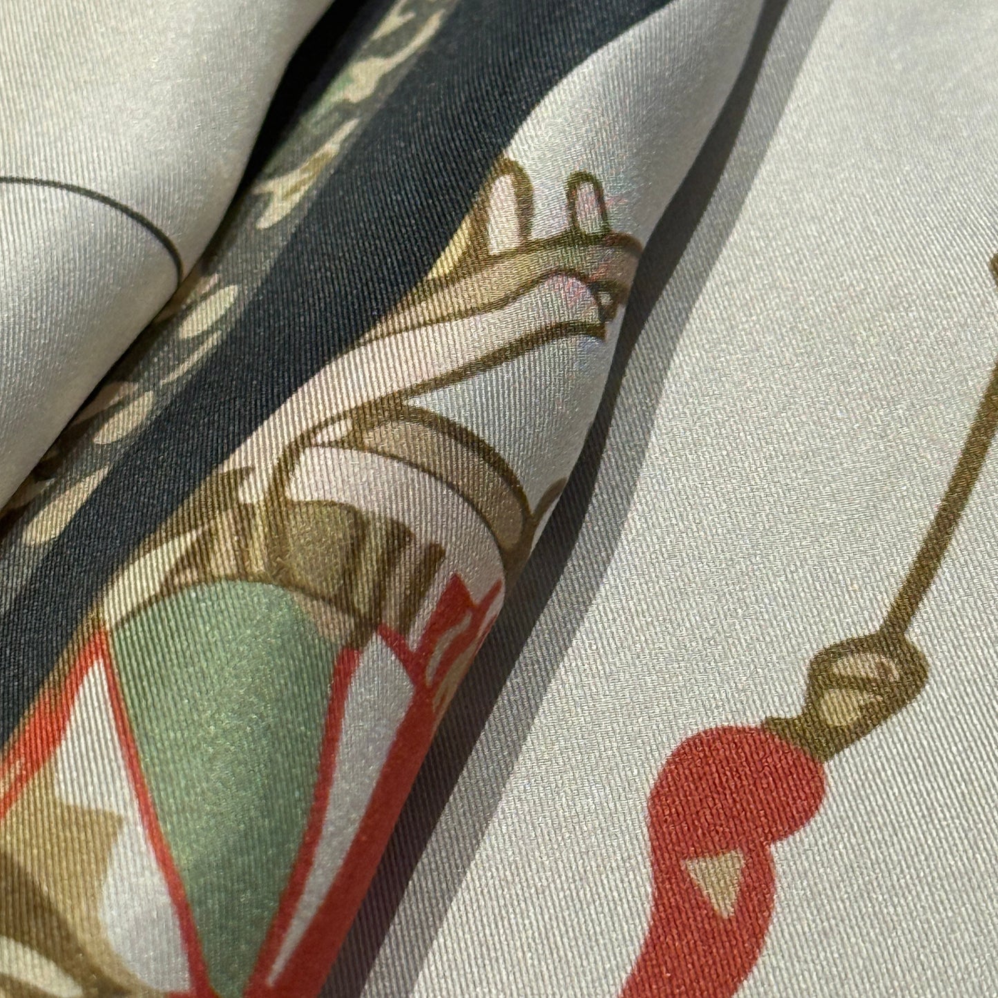 Designer silk scarf The Navigator by NOE MI, luxury square scarf with feminine surreal artwork, navigation wheel, dragonflies, and symbolic motifs.