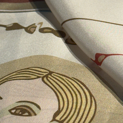 NOE MI The Navigator silk scarf, wearable art square accessory in cream and gold palette with symbolic surrealist design.