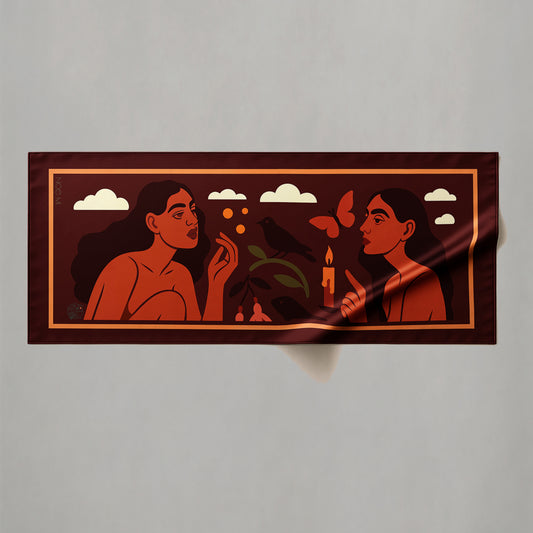 a colorful silk or chiffon pareo/sarong of two people under a cloudy sky with a candle.