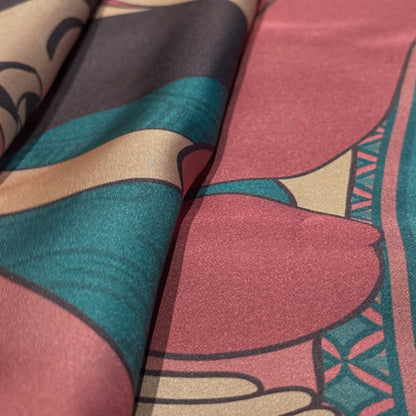 Luxury silk scarf Soft Chains by NOE MI, wearable art design in muted rose and teal colors, symbolic illustration of women with surreal storytelling motifs.
