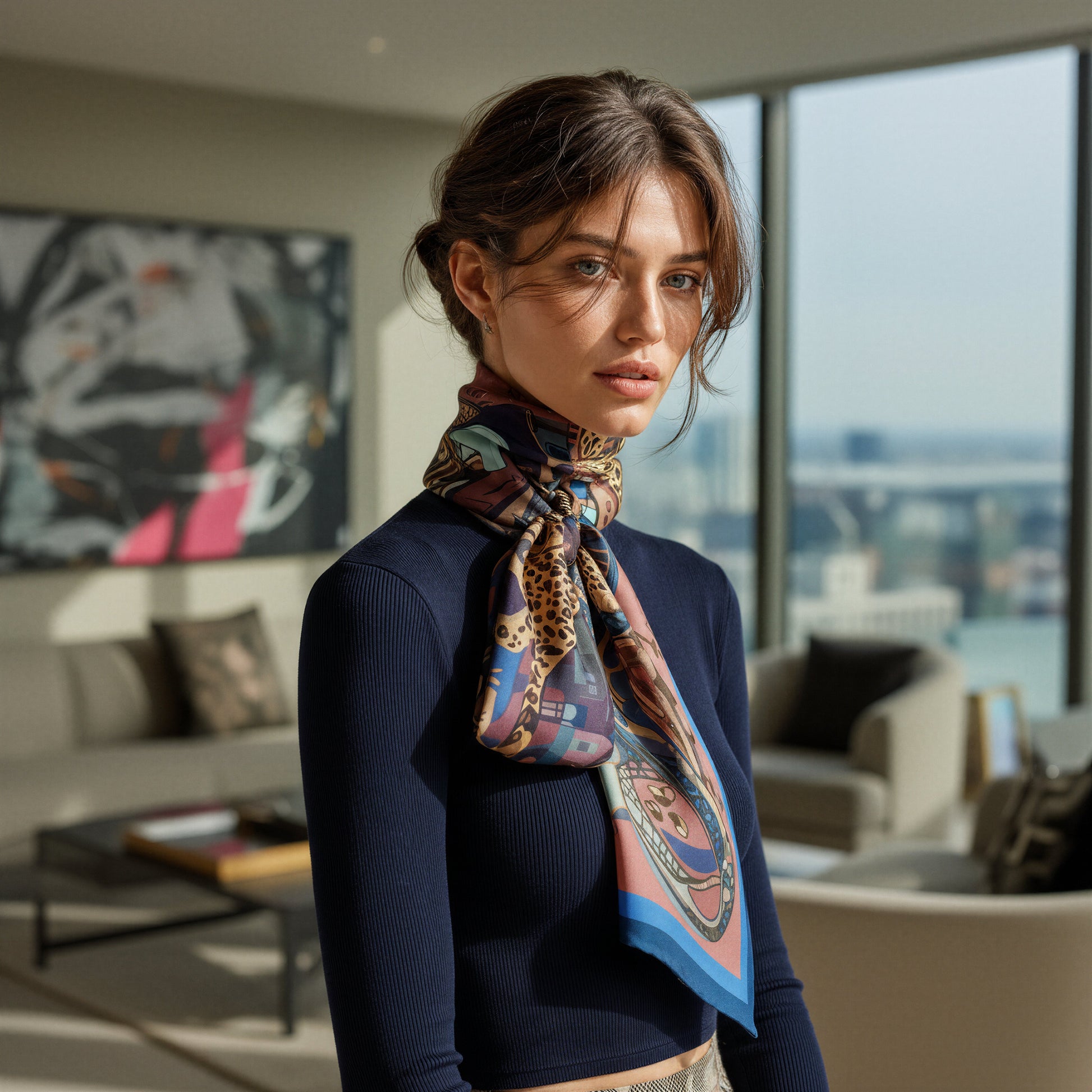NOE MI statement silk scarf featuring dynamic female rider and celestial motifs, perfect for fashion lovers seeking artistic luxury accessories.