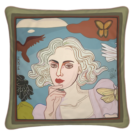 NOE MI cushion titled Morning Muse, featuring a close-up portrait of a blonde woman with soft curls surrounded by nature