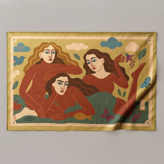 Decorative colorful silk or chiffon pareo/sarong art with three stylized female figures on a beige background