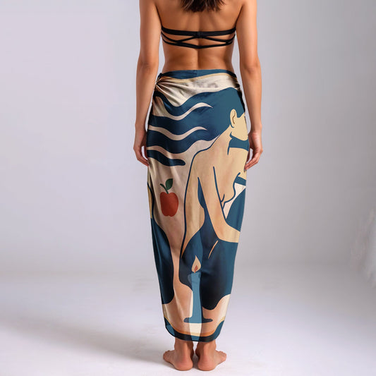 Woman wearing a colorful silk or chiffon pareo/sarong, patterned dress with a neutral background