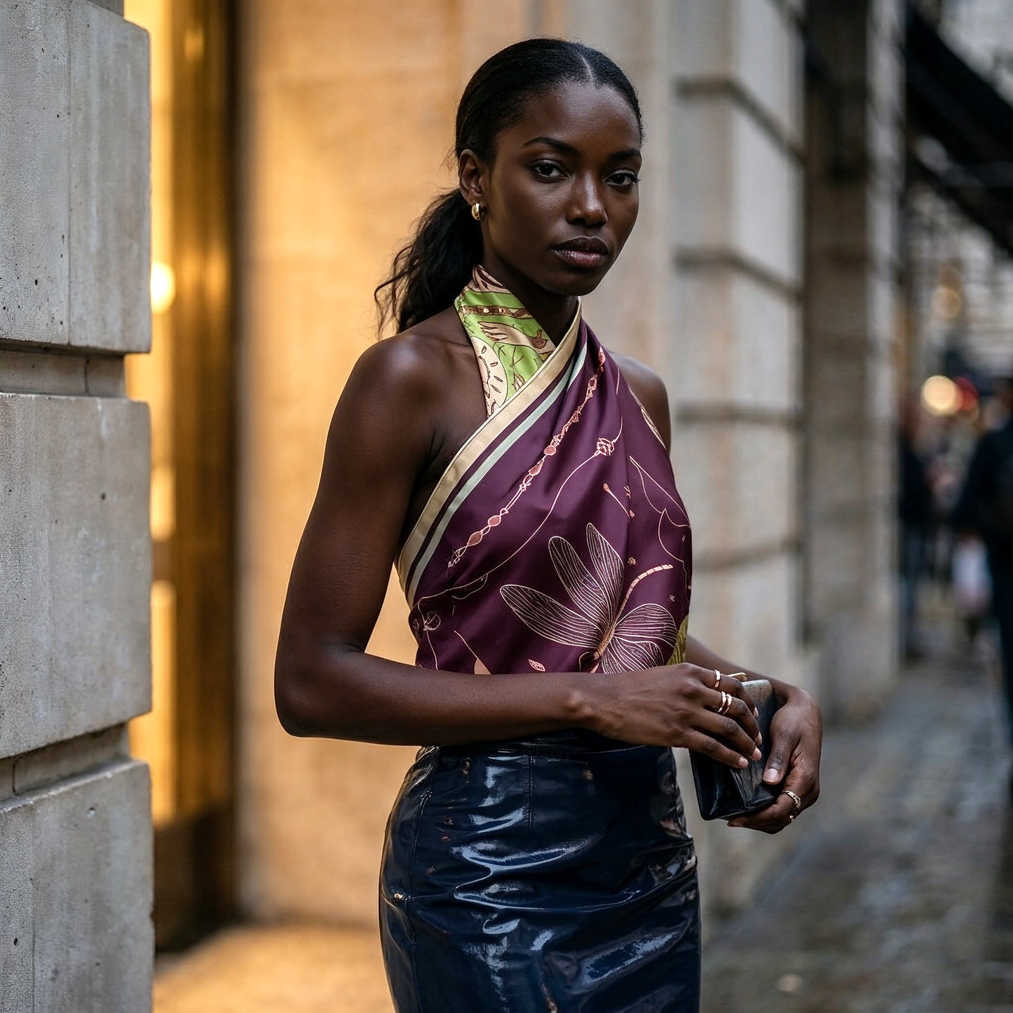 NOE MI The Navigator Amethyst square silk scarf is a luxury designer scarf in deep purple, chartreuse green, muted gold, and soft nude tones designed for bold elegant styling.