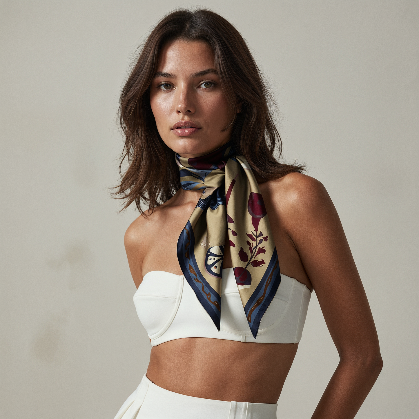 Elegant dark silk scarf with contemporary figurative artwork in deep red and blue tones, ideal for refined fashion looks in European cities such as Paris and Rome.