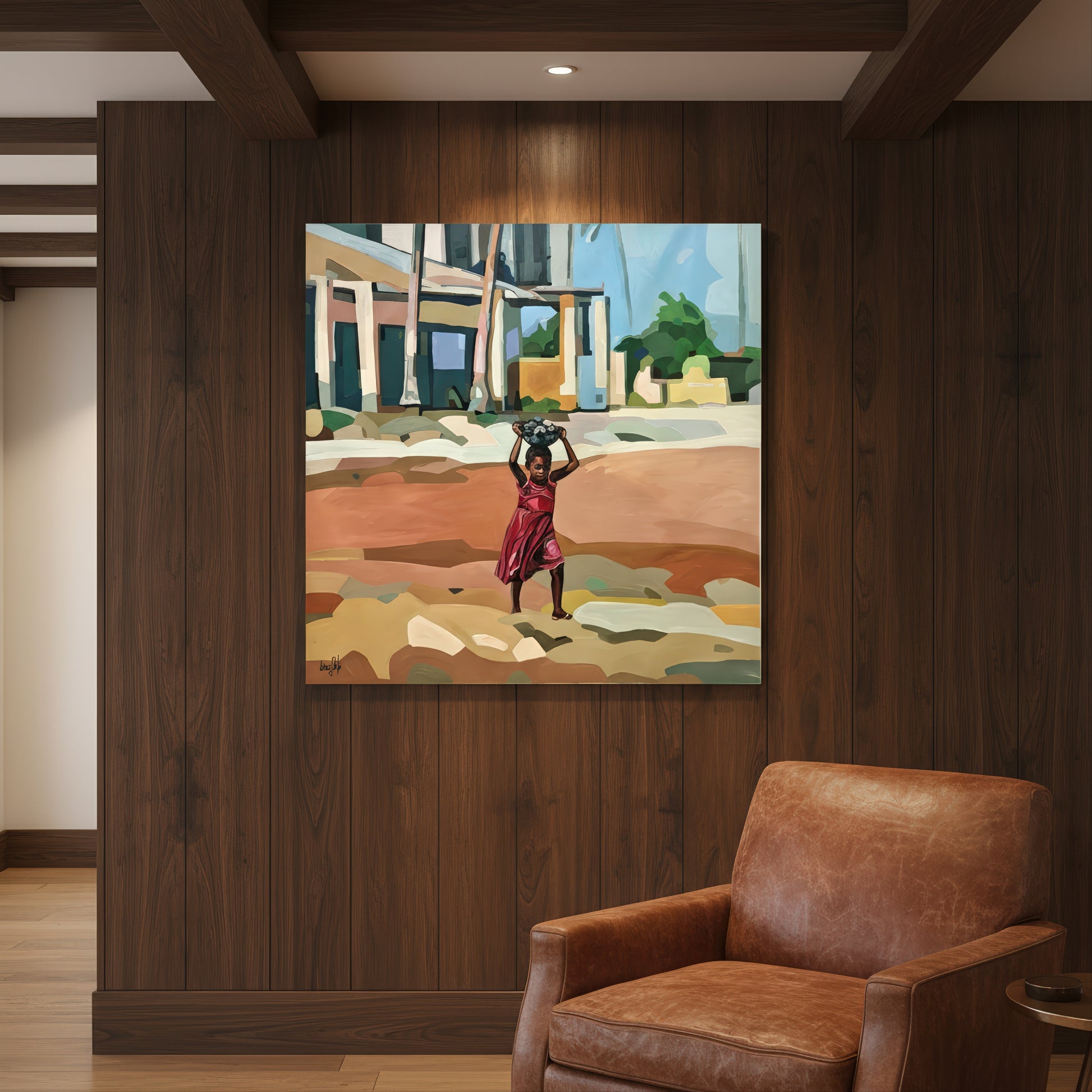 Search for my own gold by Noemi Safir is a limited edition fine art print featuring a young girl in a red dress carrying a bowl on her head while walking through a sunlit earthy landscape beside simple houses and green trees.